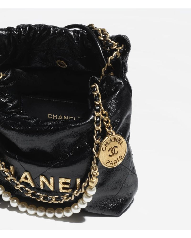 CHANEL 22 MINI HANDBAG (WITH PEARLS)